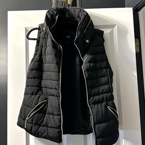 Beautiful vest. Worn once. Clean smoke free home. Warm and classy!